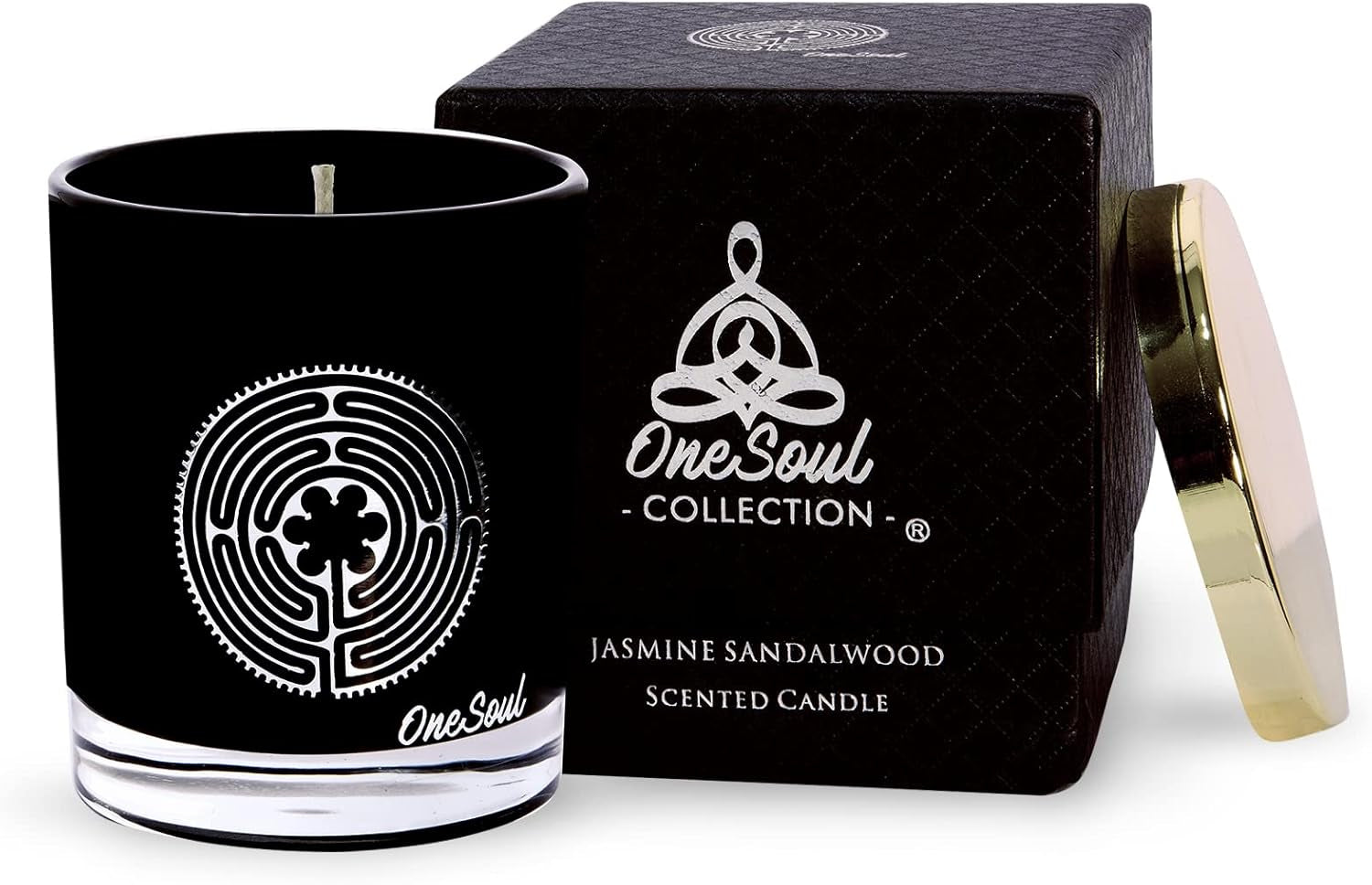 Luxury soy aromatherapy candle in black glass with sacred symbol design, available in multiple earthy and floral scents.