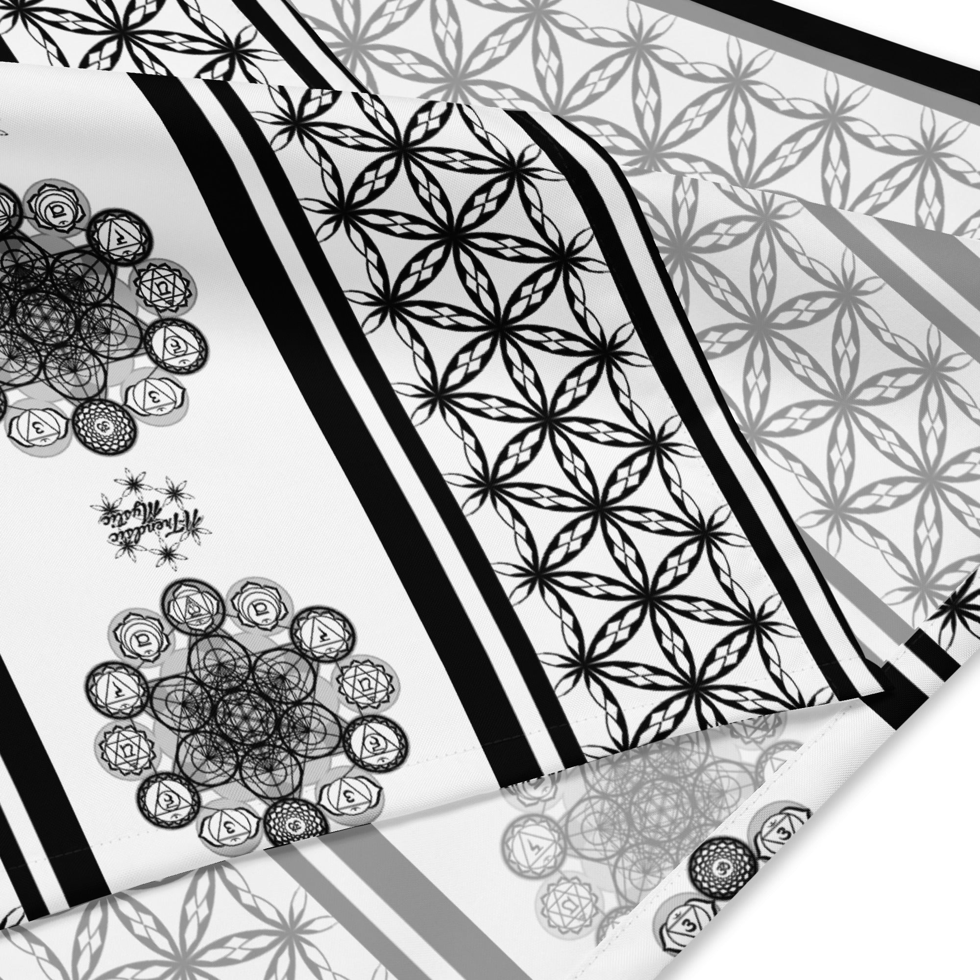 Mystic Alignment bandana — all-over geometric grid; Mystic Alignment bandana — folded triangle view.