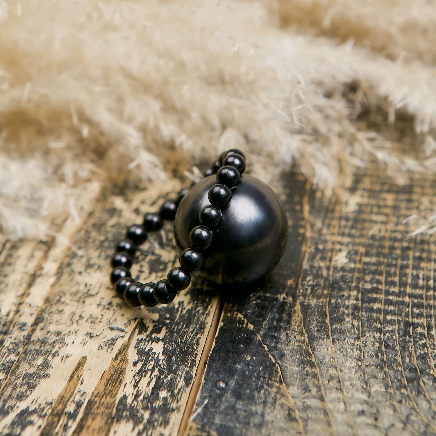 Mystic Shungite set — two stretch bracelets and a polished sphere (30 mm or 50 mm), crafted from authentic Shungite for contemplative adornment