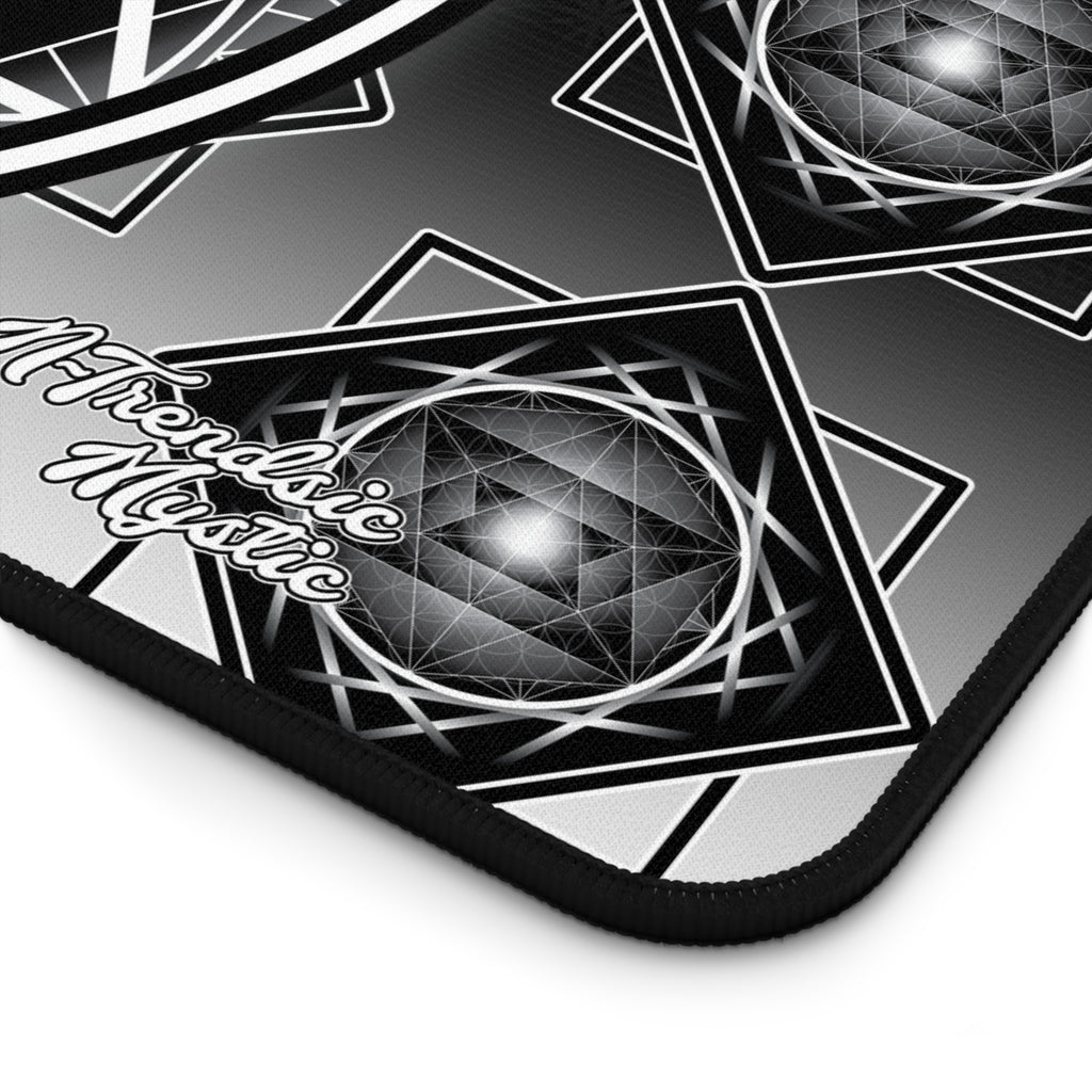 Mouse pad with geometric design and text on a white background