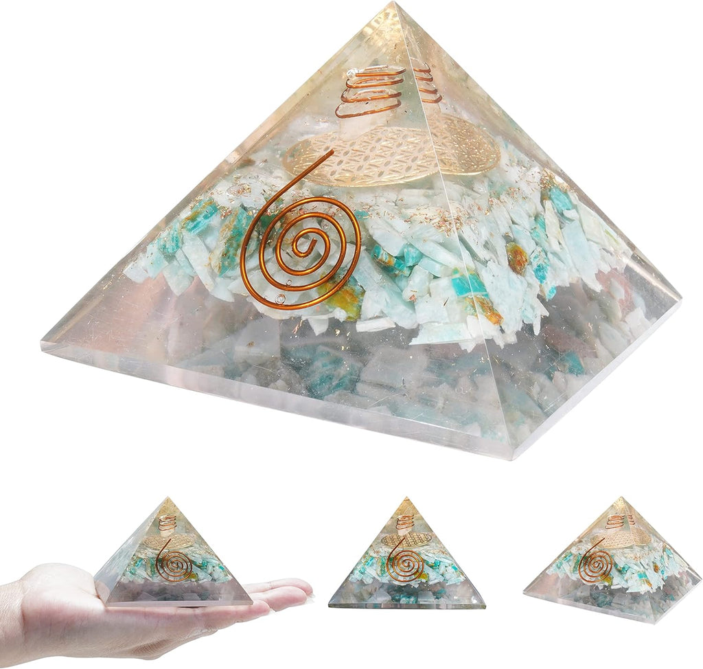 Handcrafted gemstone orgone pyramid with copper coil design, available in multiple decorative variations.
