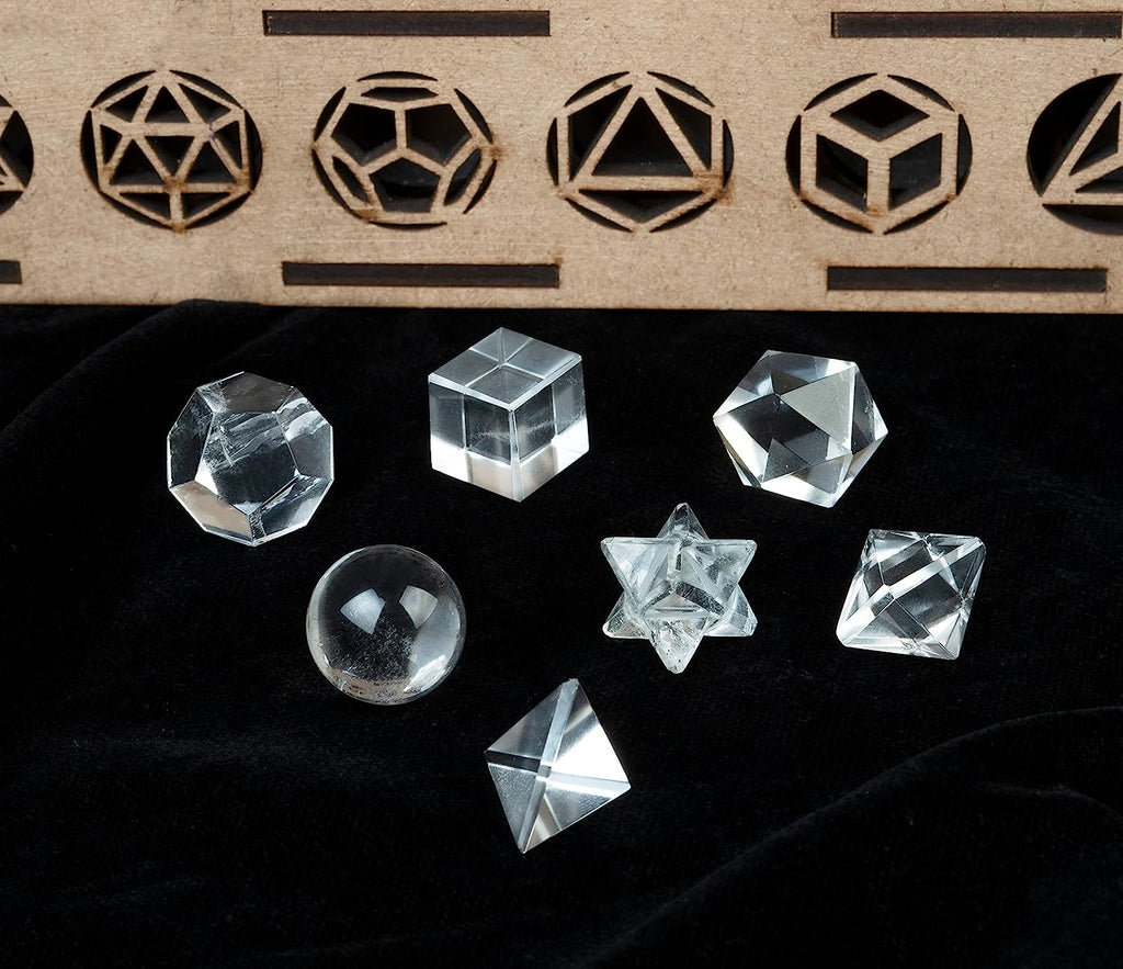 Set of Platonic solid sacred geometry crystals in multiple gemstone options, hand-carved 15–20mm pieces for meditation, grids, or display.