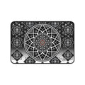 Ascension Grid desk mat with black-and-white sacred geometry rosette, concentric lines, and diamond mandalas on stitched-edge mat