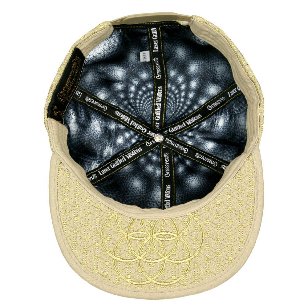 Beige cap with embroidered design on the front and black interior with brand name.