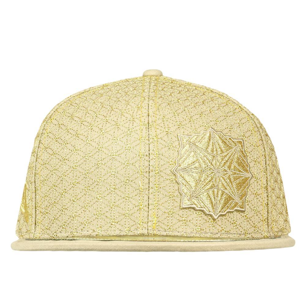 Yellow textured cap with a geometric star design on a white background