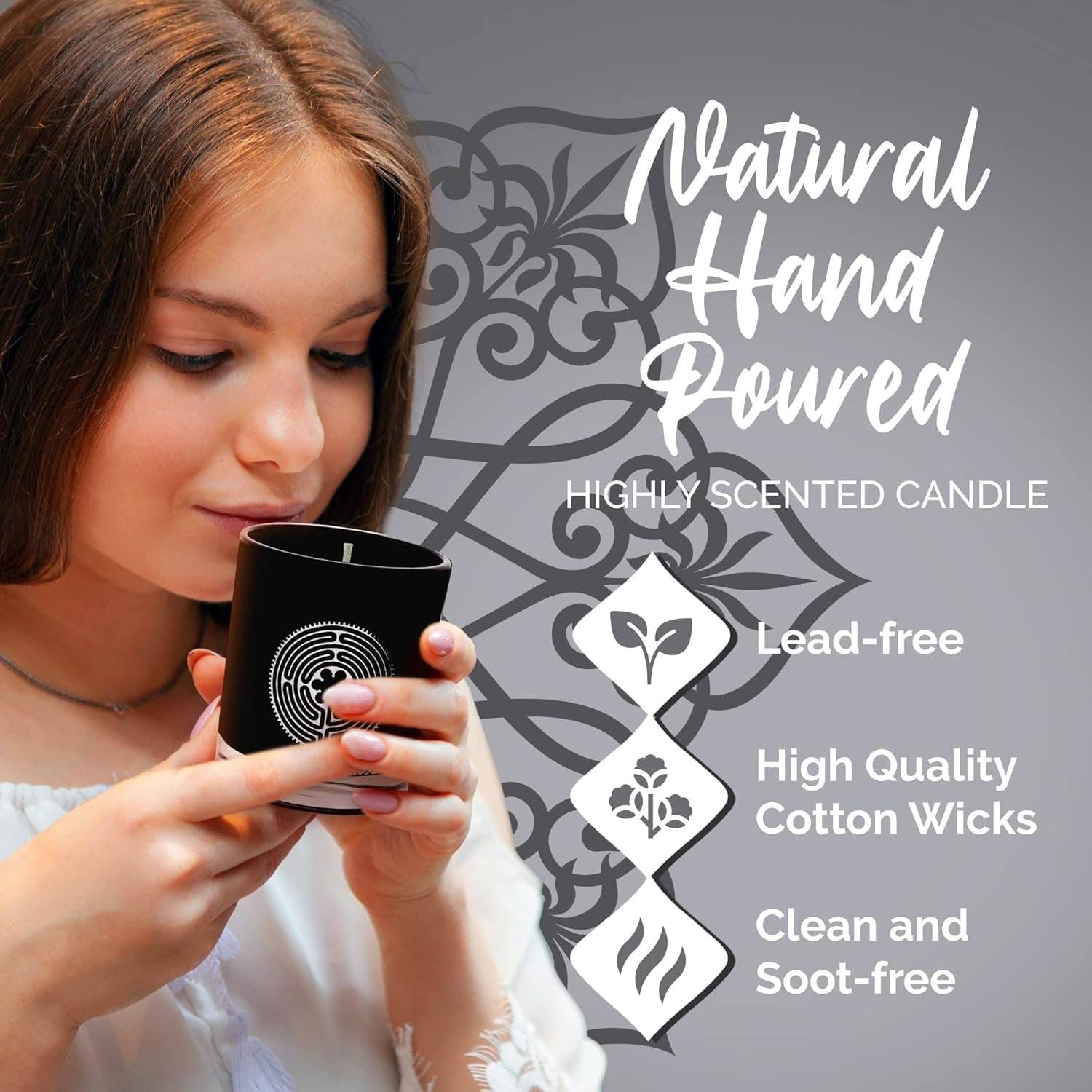 Luxury soy aromatherapy candle in black glass with sacred symbol design, available in multiple earthy and floral scents.