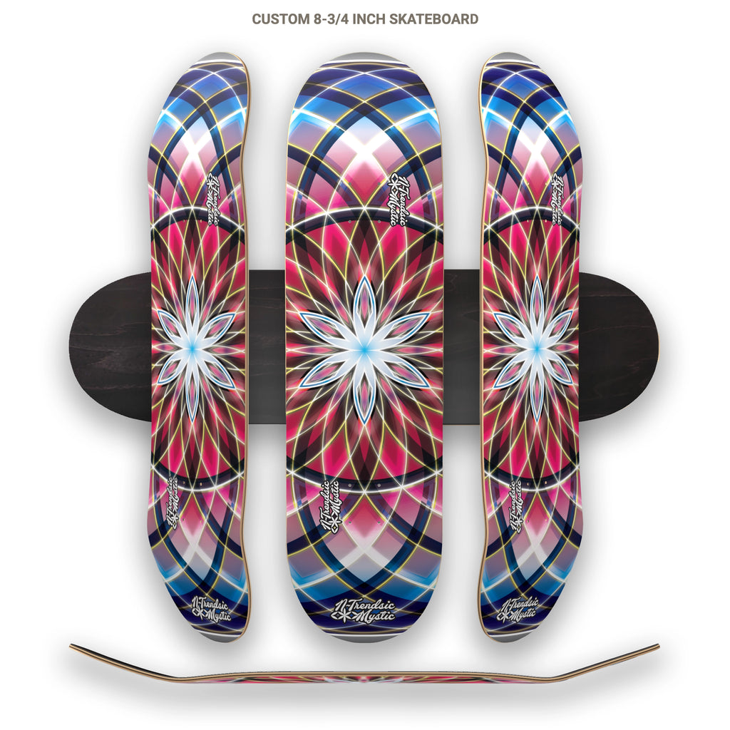 Three colorful skateboard decks with a geometric design on a white background