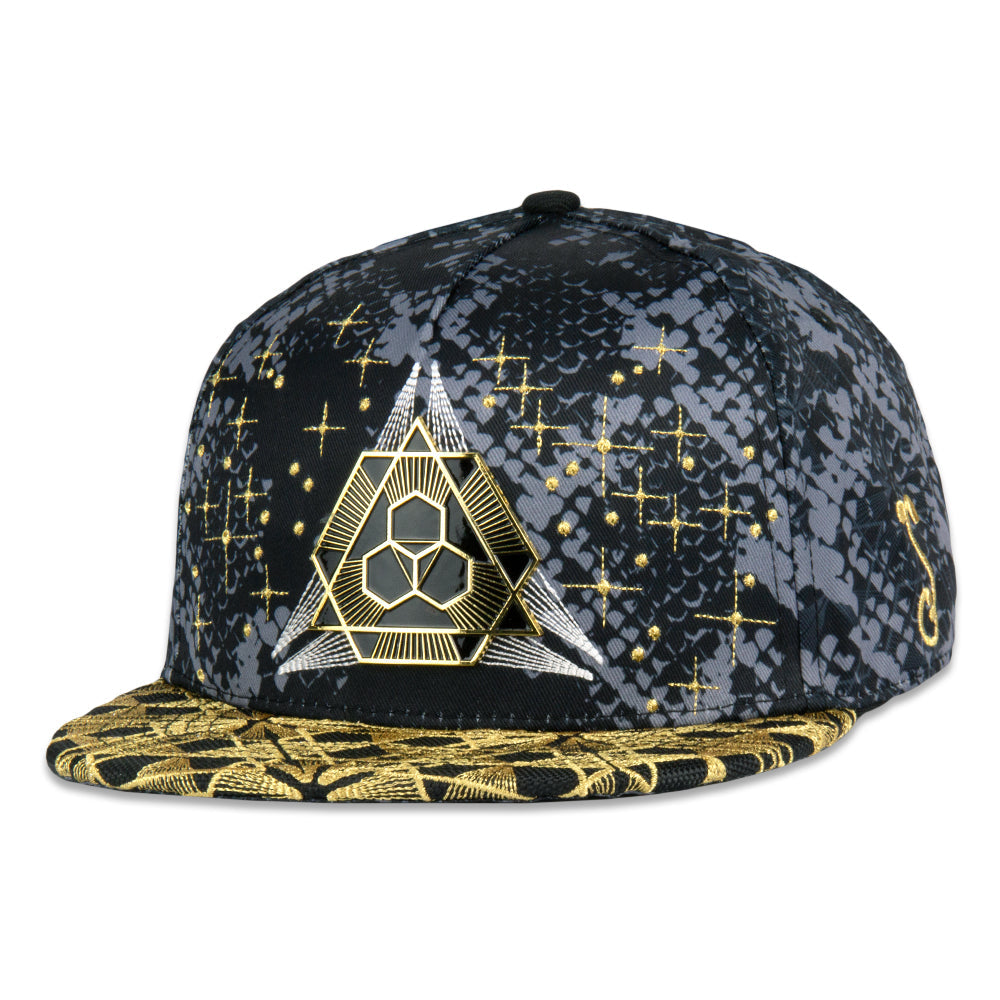 Black and gold cap with geometric design on a white background