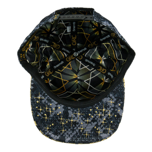 Cap with geometric pattern on front and starry night design on back