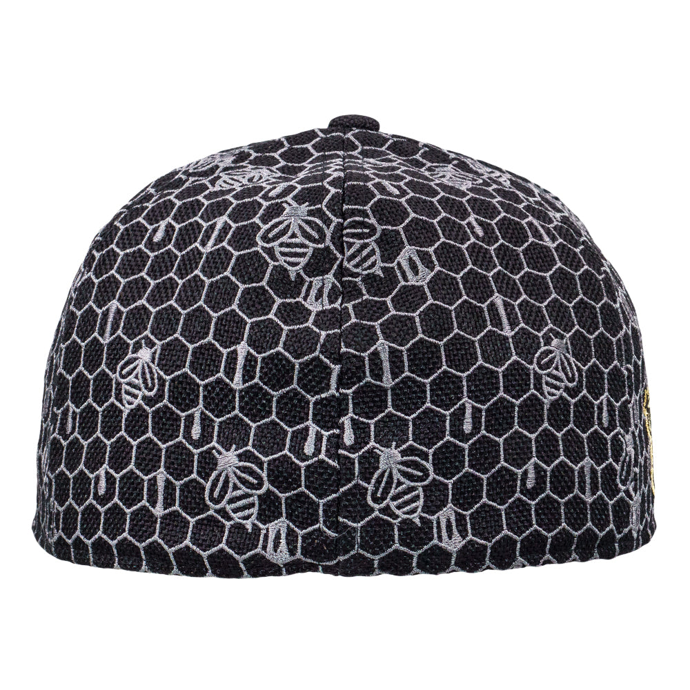 Black cap with white honeycomb pattern on a white background