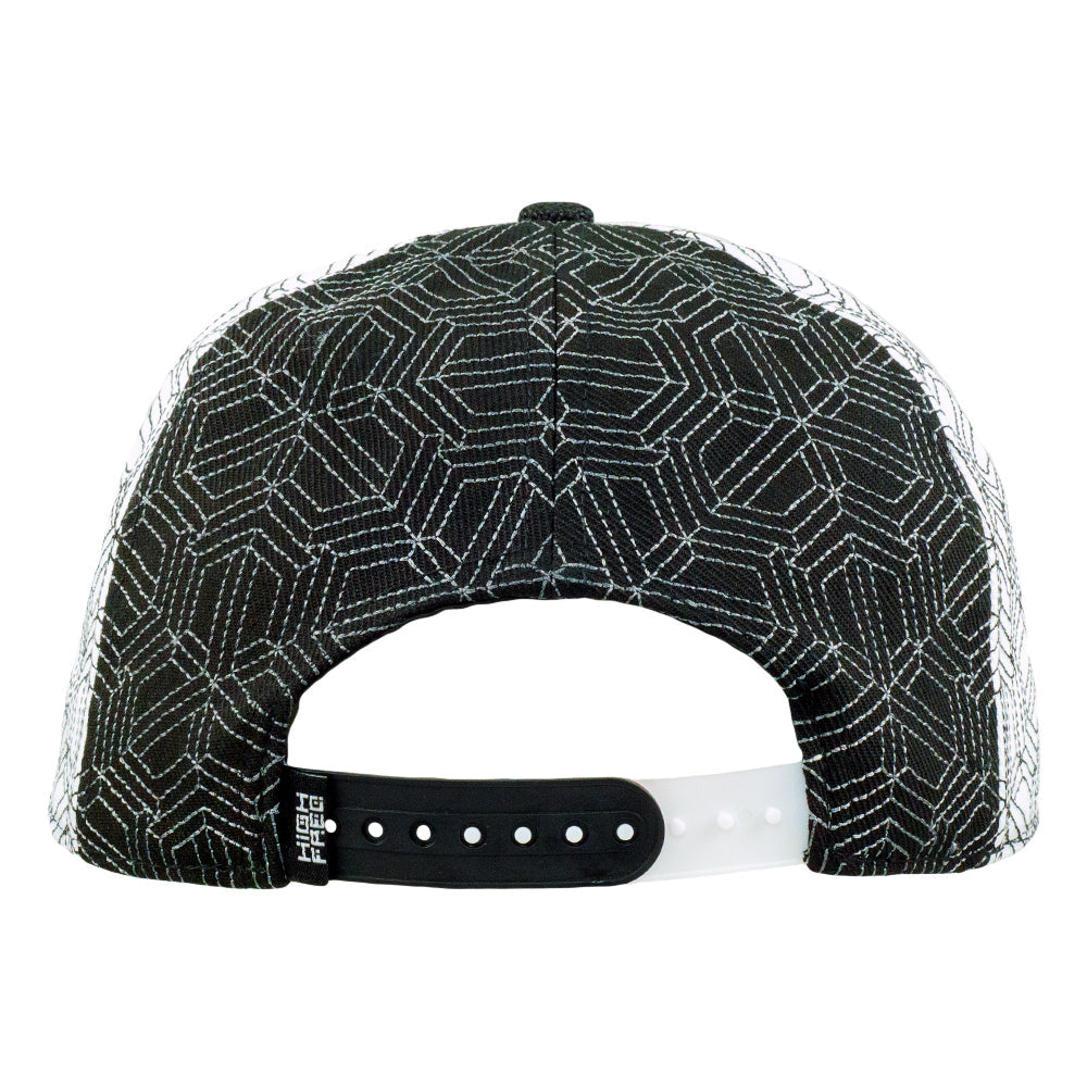 Black and white geometric patterned cap on a white background