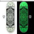 Glow in the dark skateboard deck showing day and night appearance