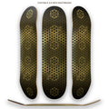 The Armory gold foil sacred geometry skateboard deck with repeating Flower of Life pattern on 7-ply Canadian maple, designed by NTrendSic Mystic.