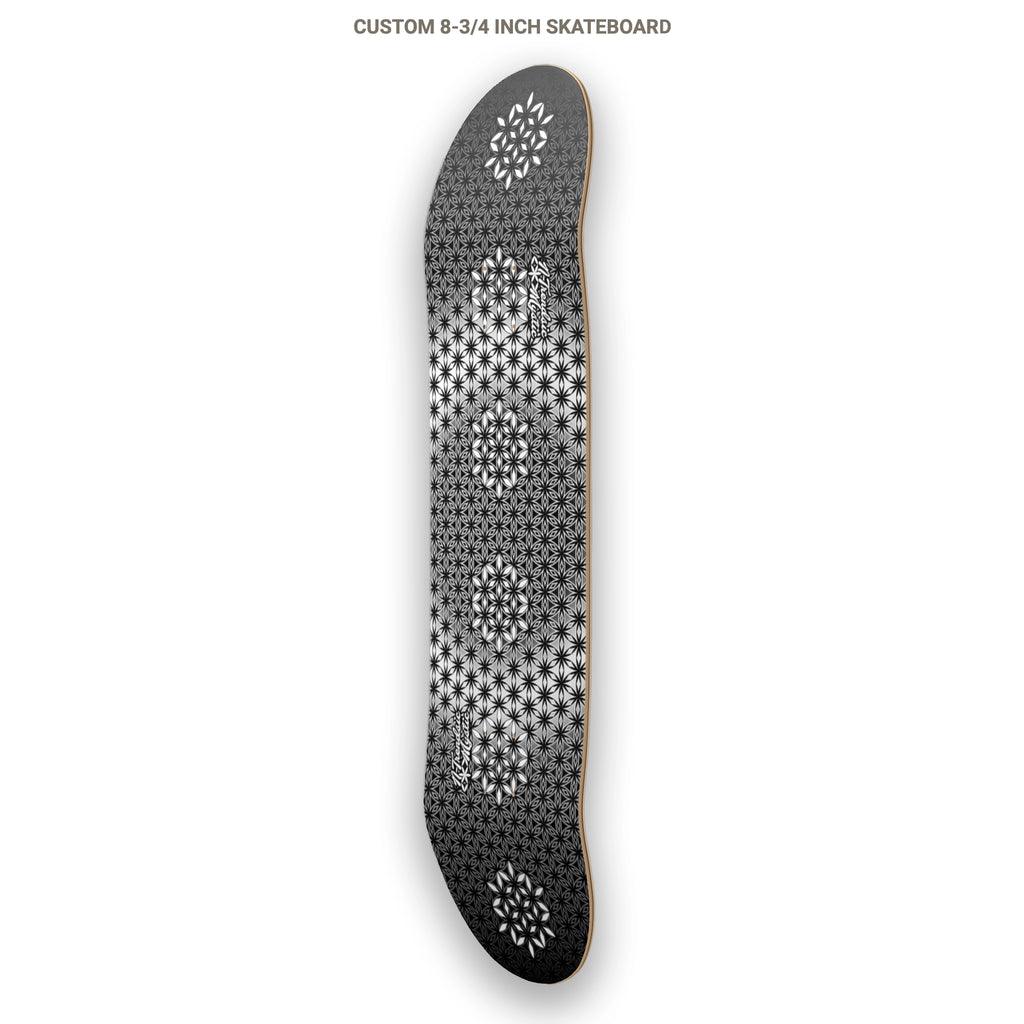 The Armory monochrome sacred geometry skateboard deck with repeating Flower of Life pattern on 7-ply Canadian maple, designed by NTrendSic Mystic.