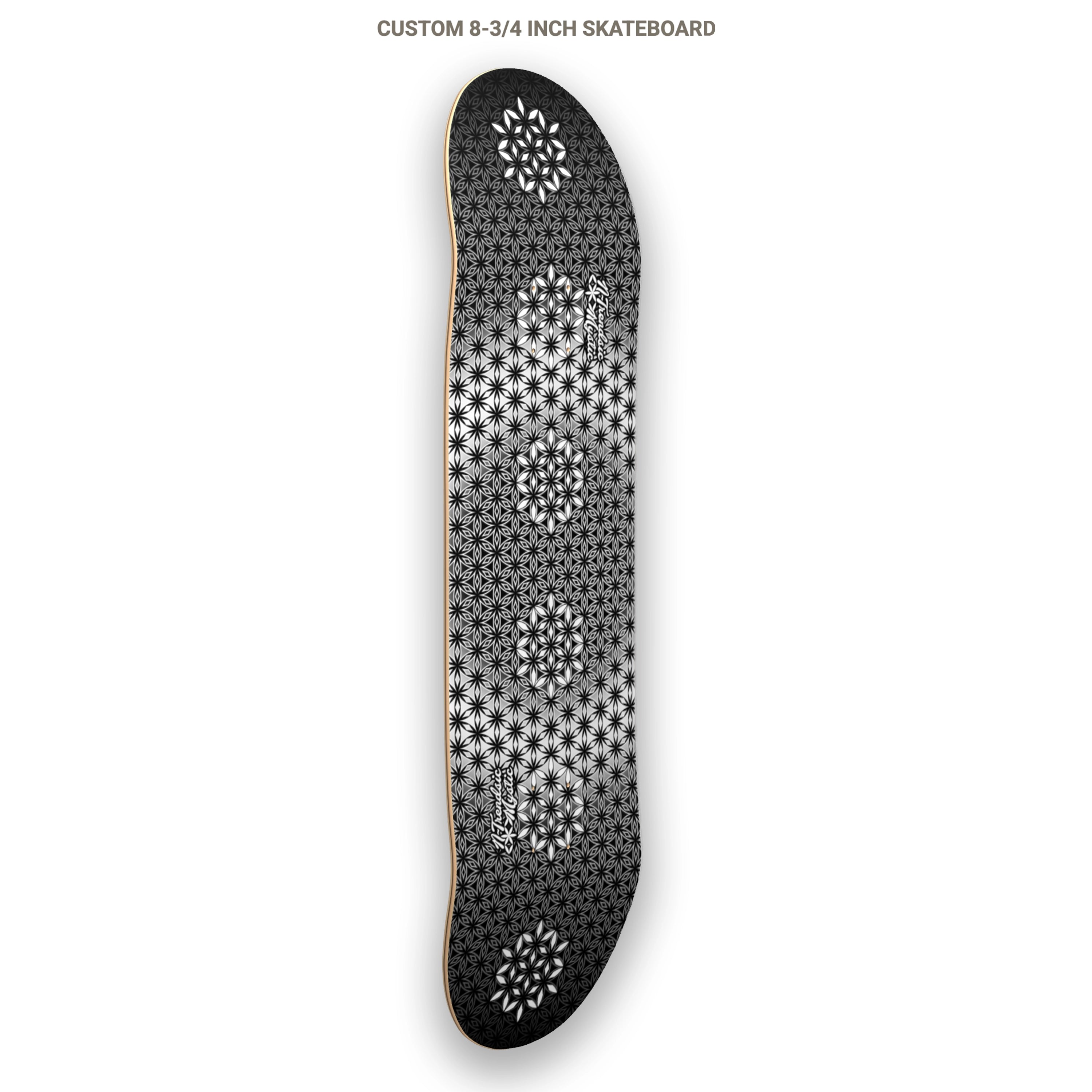 The Armory monochrome sacred geometry skateboard deck with repeating Flower of Life pattern on 7-ply Canadian maple, designed by NTrendSic Mystic.