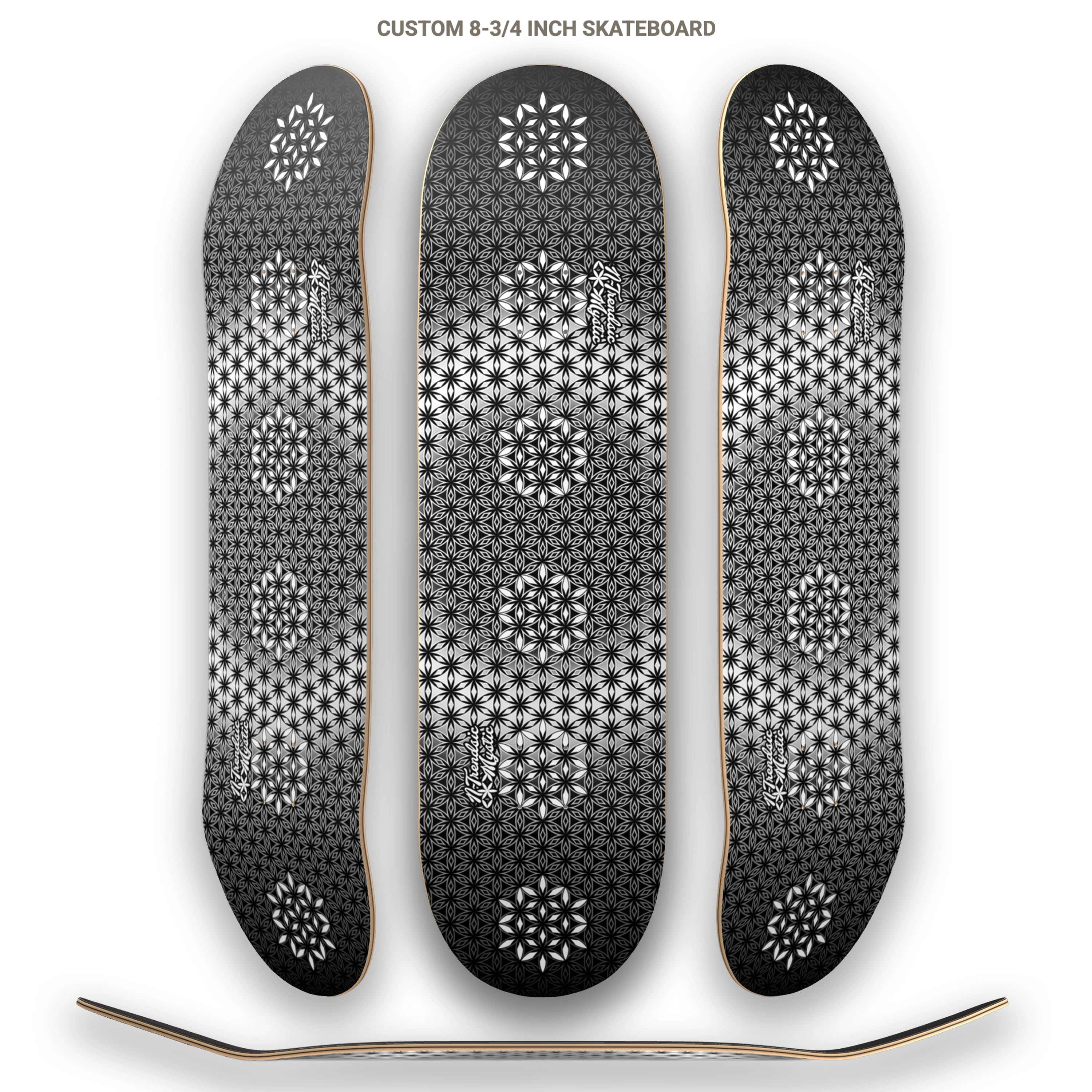 The Armory monochrome sacred geometry skateboard deck with repeating Flower of Life pattern on 7-ply Canadian maple, designed by NTrendSic Mystic.