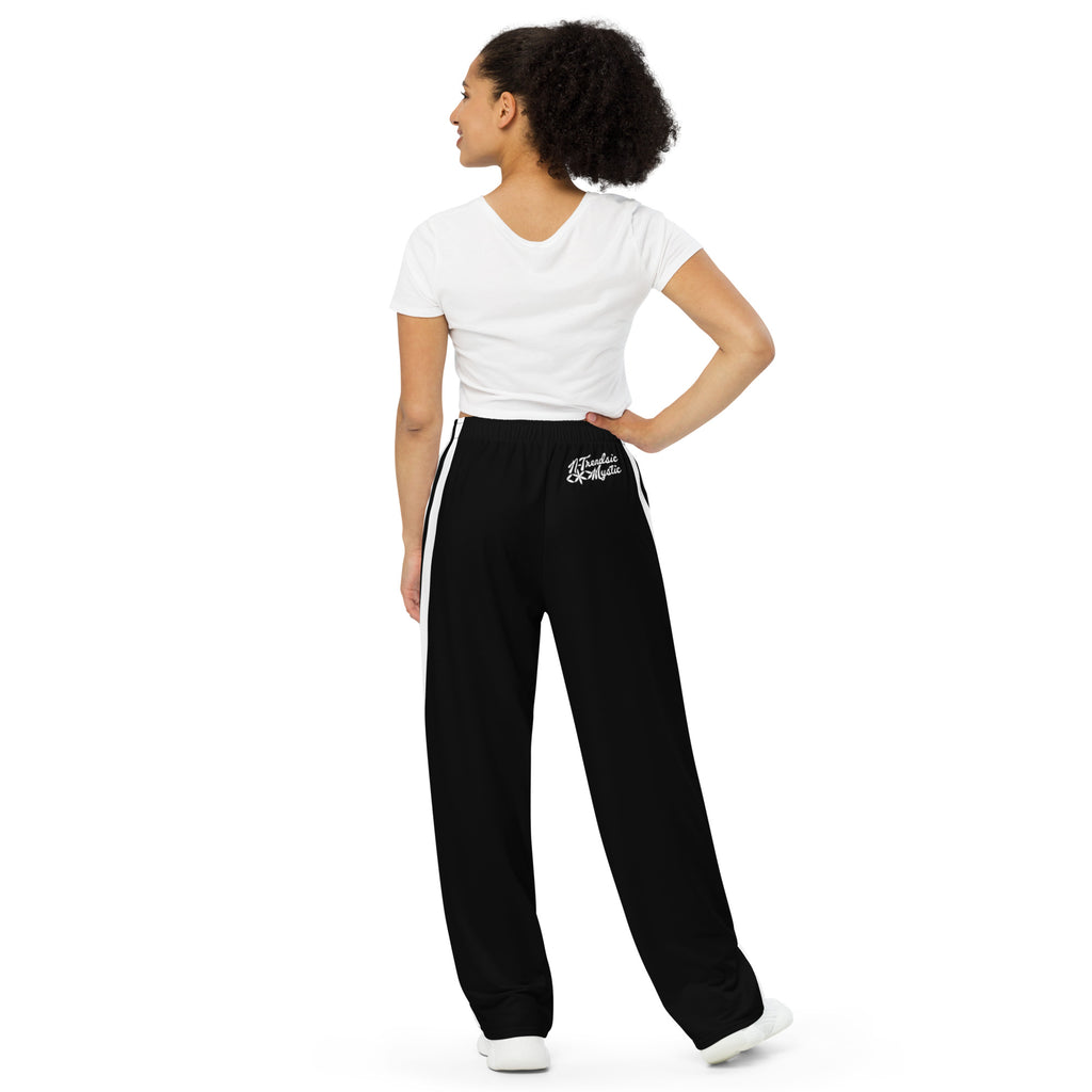 Mystic Stripes unisex wide-leg pants — cosmic stripe all-over print (back view)