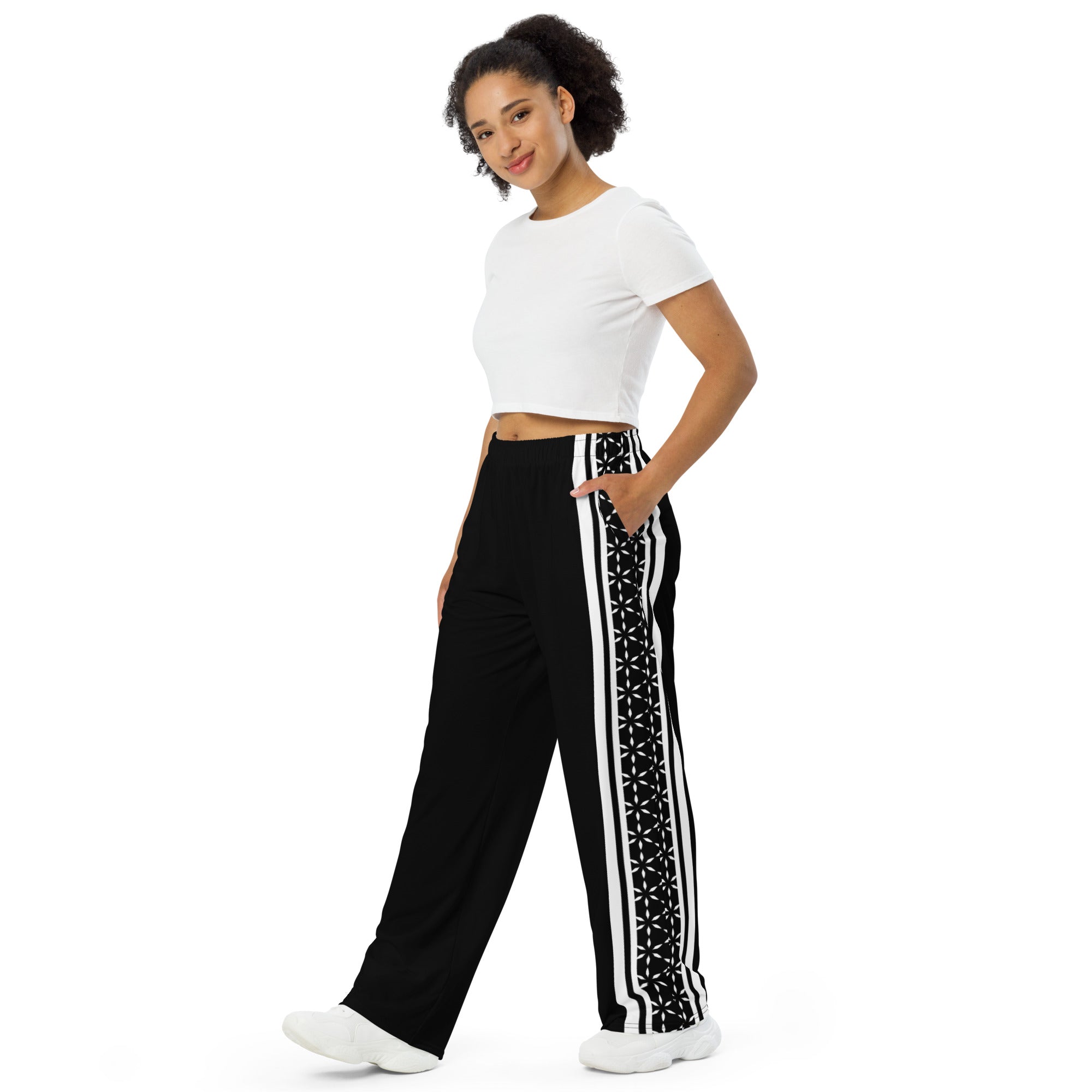Mystic Stripes unisex wide-leg pants — cosmic stripe all-over print (side view)