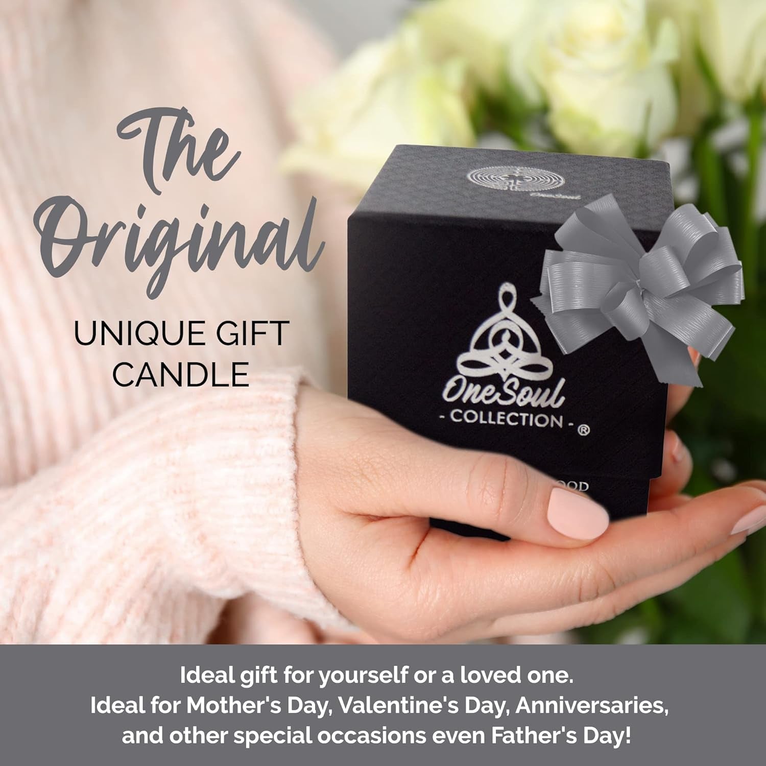 Luxury soy aromatherapy candle in black glass with sacred symbol design, available in multiple earthy and floral scents.