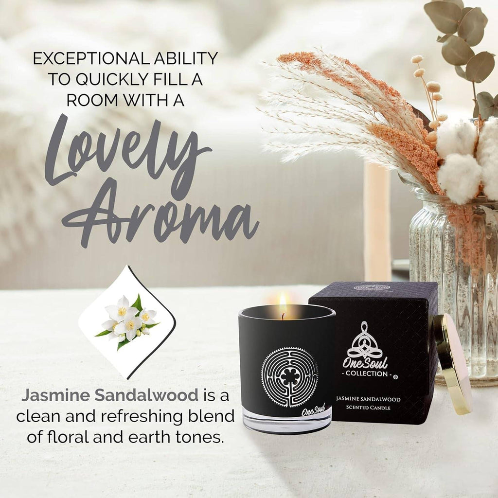 Luxury soy aromatherapy candle in black glass with sacred symbol design, available in multiple earthy and floral scents.