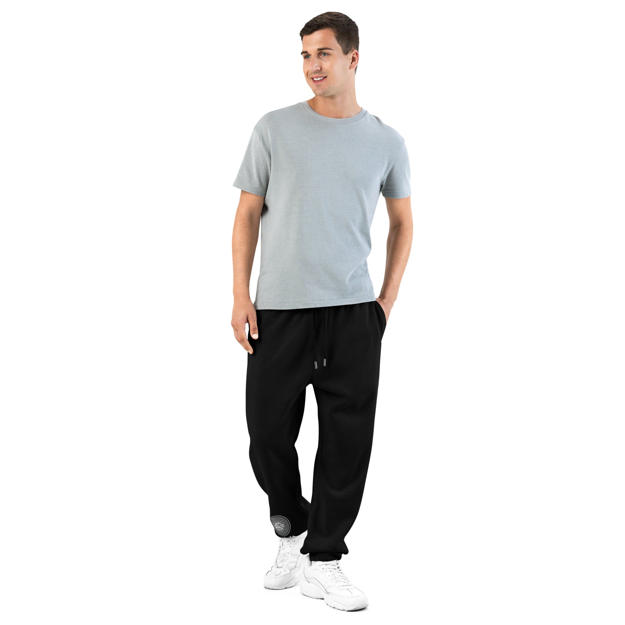 Model wearing black NTrendSic Keystone urban sweatpants made from heavyweight fleece with relaxed fit, elastic cuffs, zippered pockets, and minimalist streetwear design. Product mockup