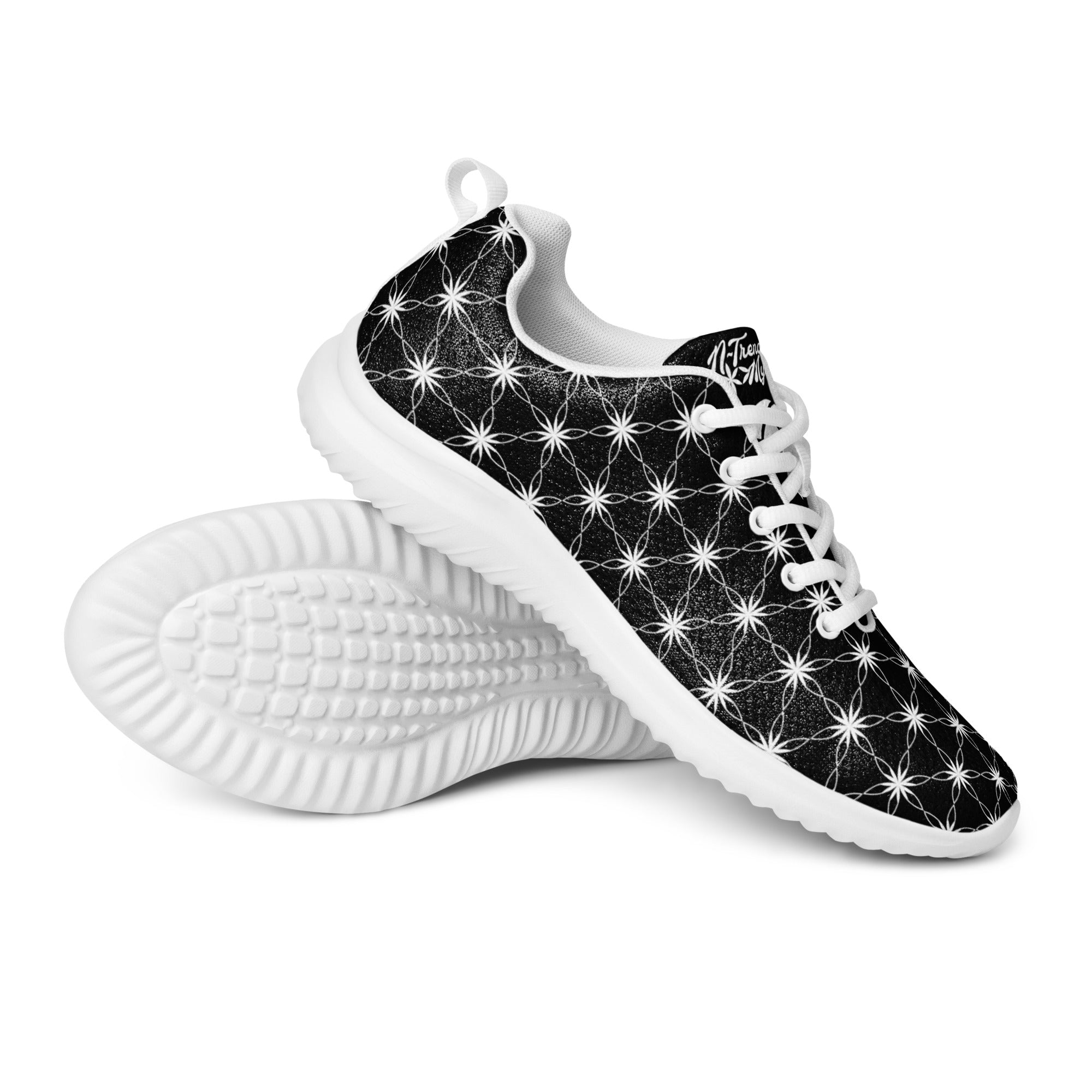 Men’s athletic shoes with all-over black-and-white Flower of Life pattern, white sole, and NTrendSic Mystic branding.