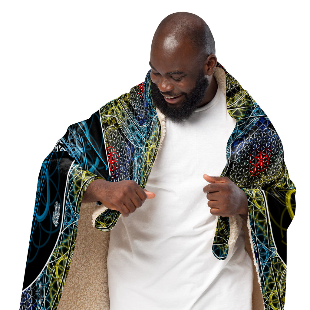 Full-size sherpa blanket worn upright, featuring the SATOR Square and colorful sacred geometry design.