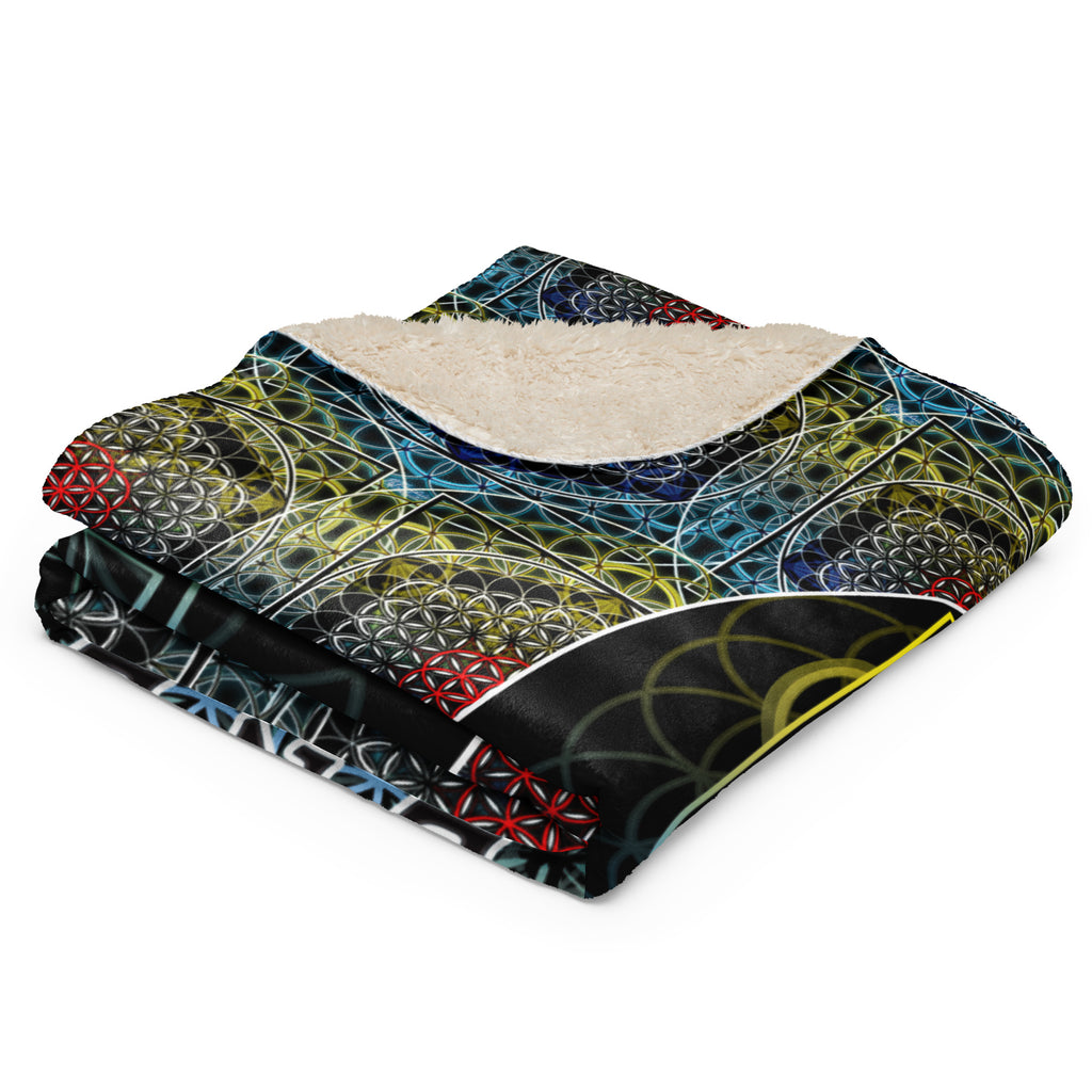 Folded sherpa blanket with plush fleece backing and vibrant SATOR Square geometric print.
