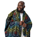Full-size sherpa blanket worn upright, featuring the SATOR Square and colorful sacred geometry design.