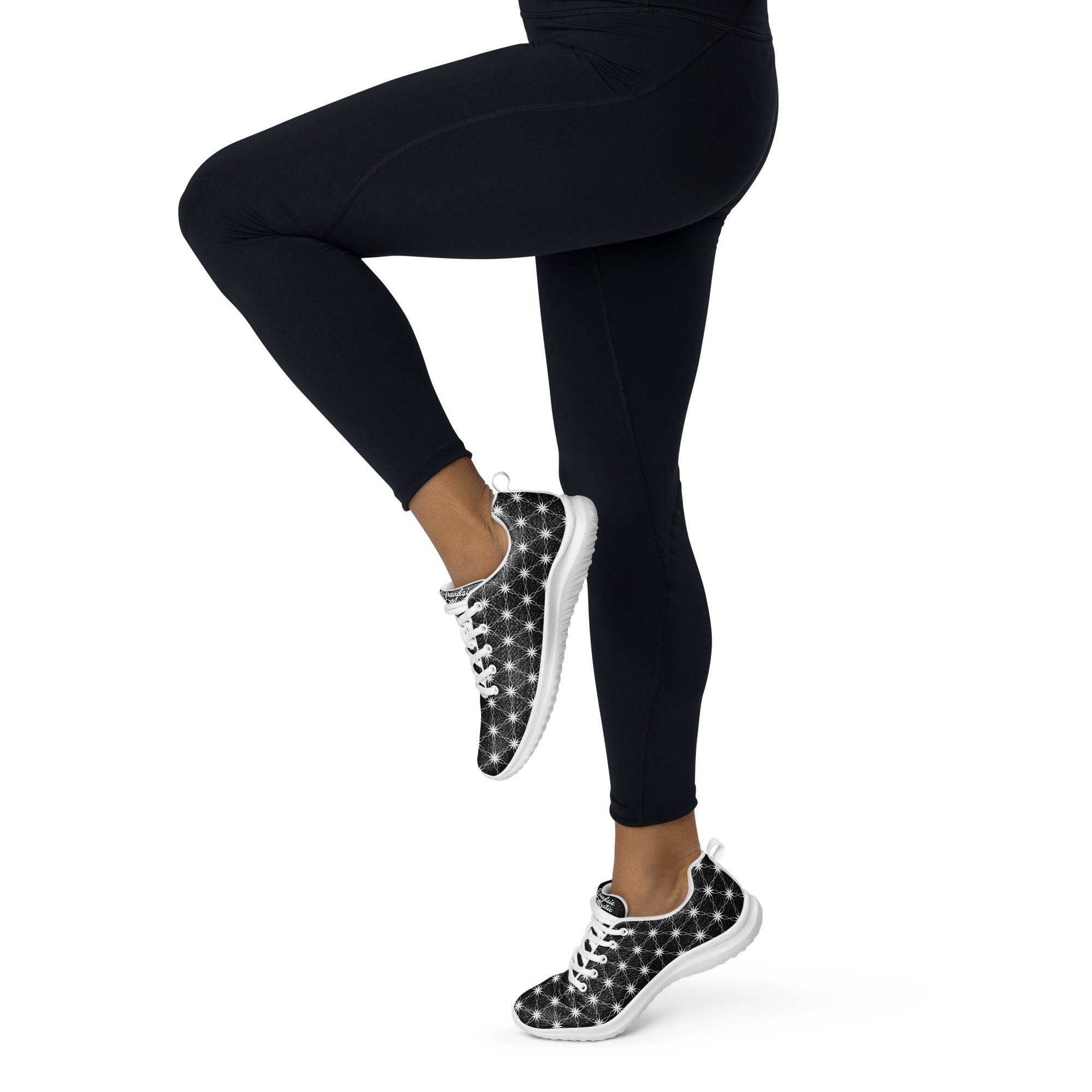 Women’s athletic shoes featuring all-over black-and-white Flower of Life pattern, white sole, and NTrendSic Mystic logo.